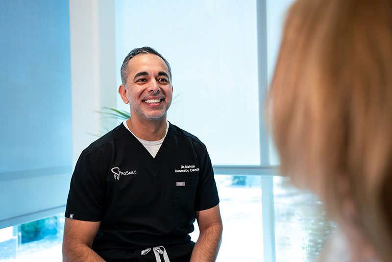 Doctor consulting With Patient