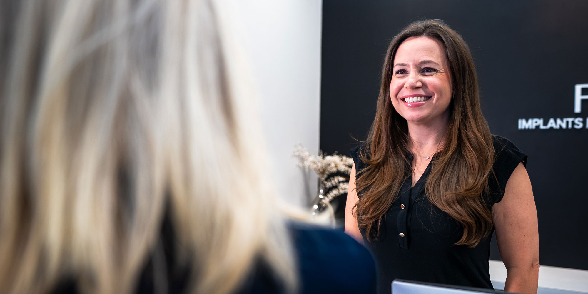 Team member consulting with Patient