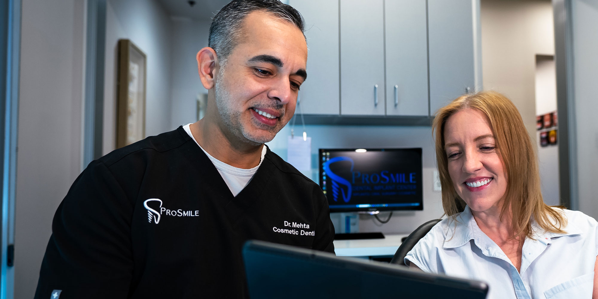 Doctor going over documents with Patient