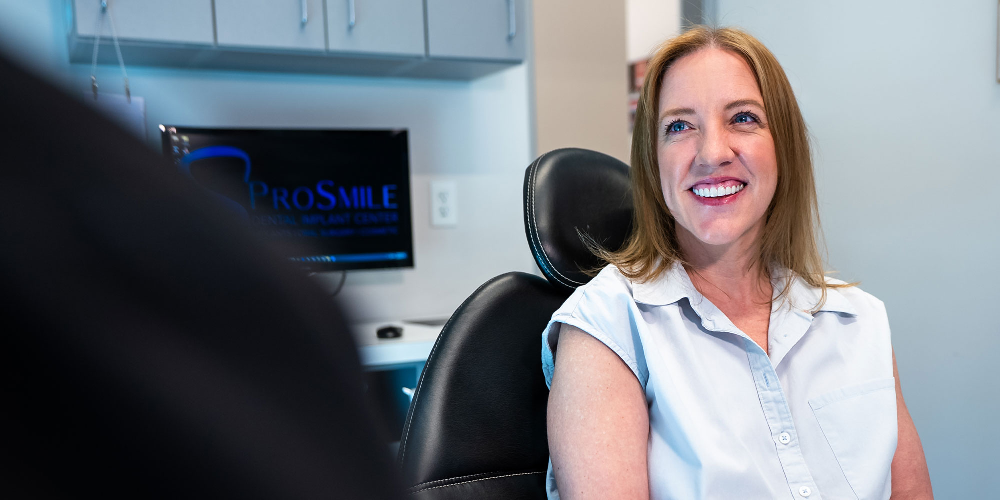 Patient smiling at doctor
